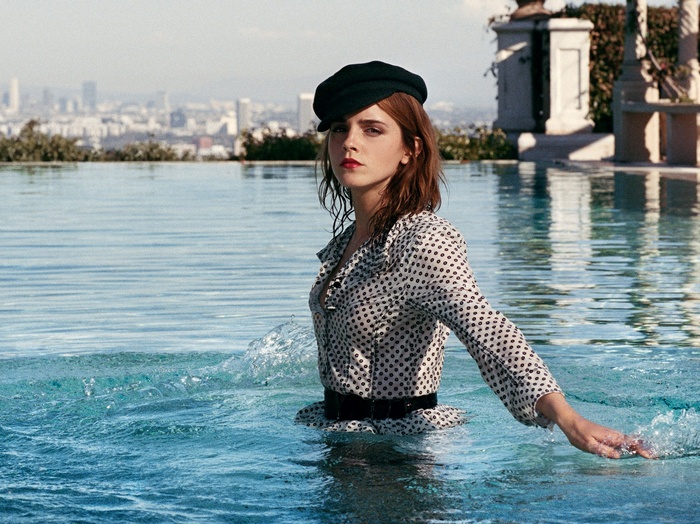 Emma Watson in a swimming pool wearing a hat