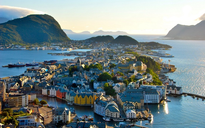 Alesund, Norway cityscape with mountains and water