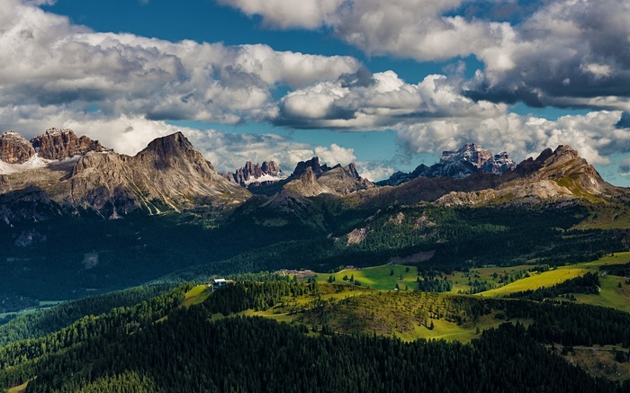Dolomites Mountains in Italy under a Cloudy Sky