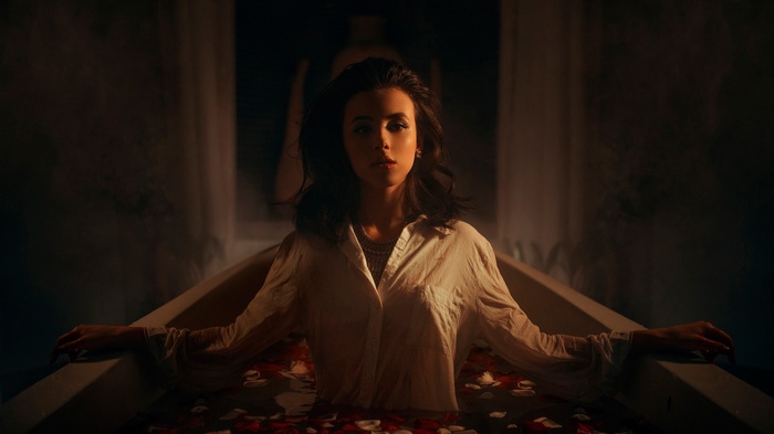 Aliya Lando in a bathtub with rose petals