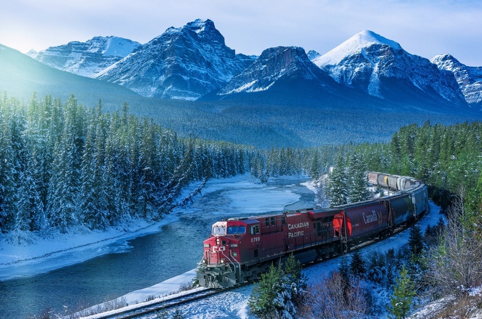 Canadian Pacific train in a snowy mountain landscape