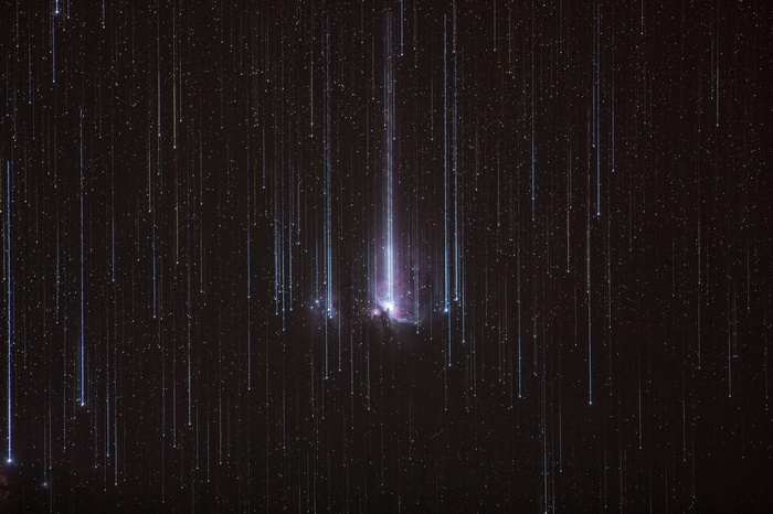 Digital art of a meteor shower over the Orion Nebula