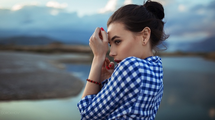 Woman in plaid shirt by Ivan Gorokhov