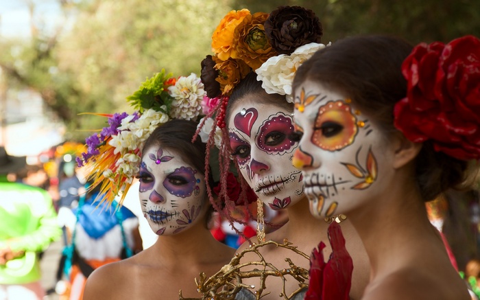 Women with Sugar Skull makeup and flower crowns