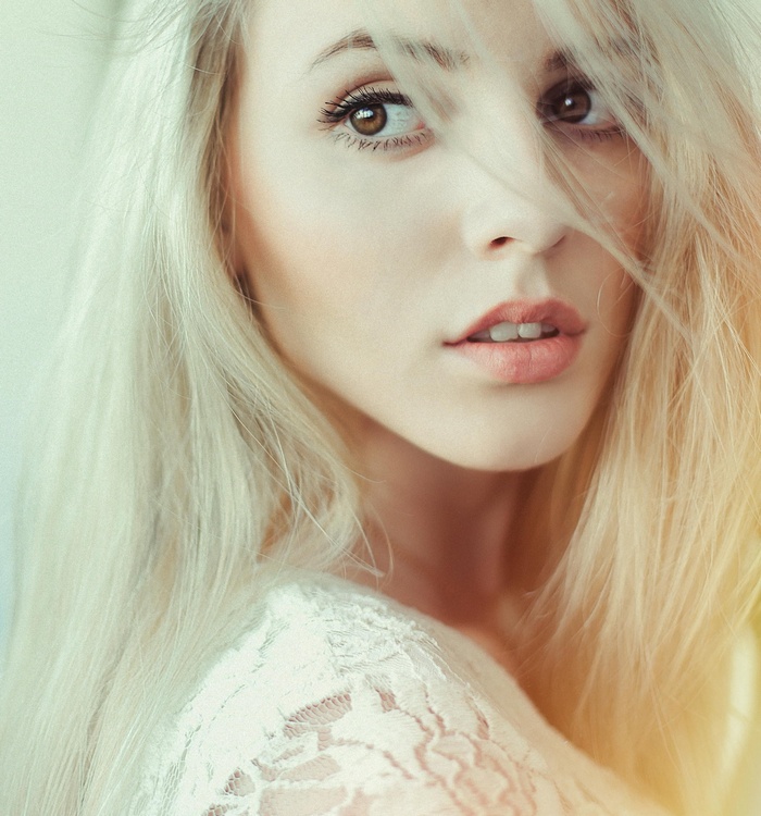 Igor Bilberry with platinum blonde hair and hazel eyes