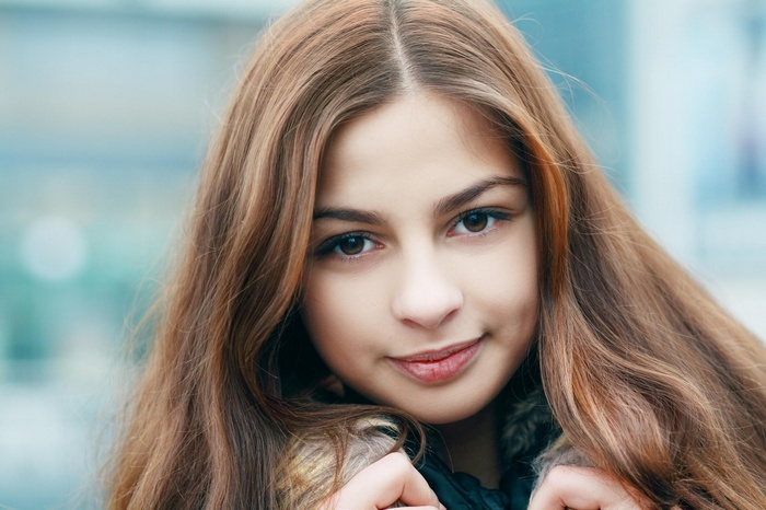 Young woman with auburn hair