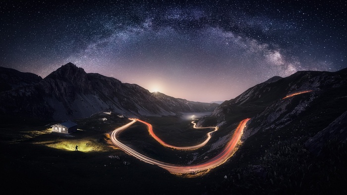 Milky Way over a mountain road in Italy