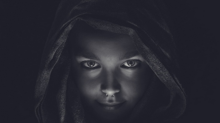 Woman with nose ring wearing a headscarf