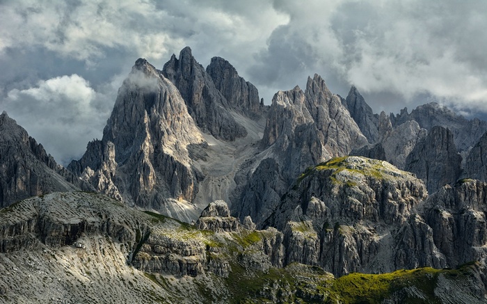 Dolomites mountains in Italy under cloudy sky