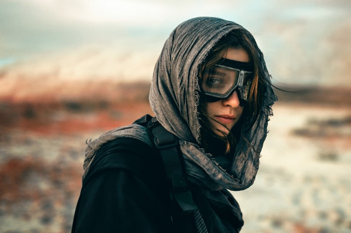 Woman in apocalyptic attire with goggles
