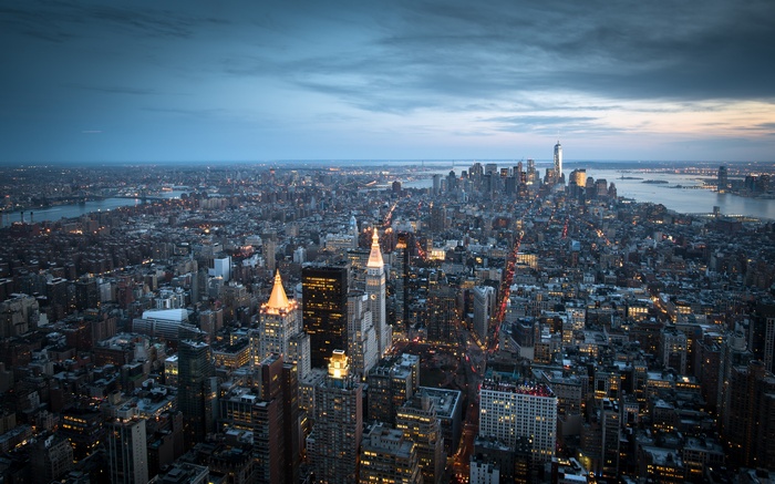 New York City skyline at dusk with city lights