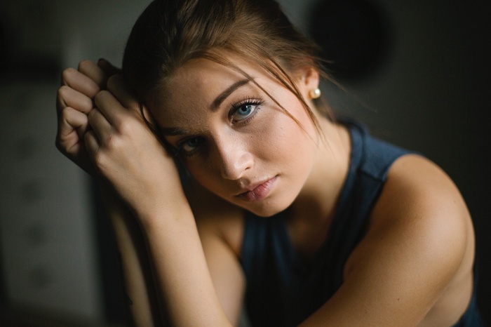 Portrait of a young woman with blue eyes
