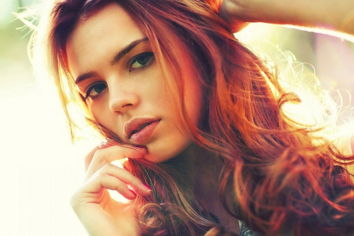 Darya Lebedeva with red curly hair