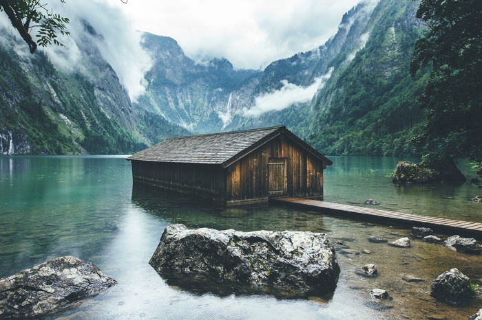 Wooden boathouse on a lake in Berchtesgaden National Park, Germany