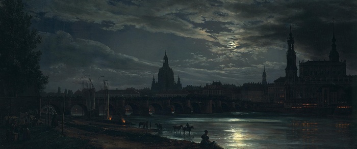 Dresden by moonlight with a bridge and river