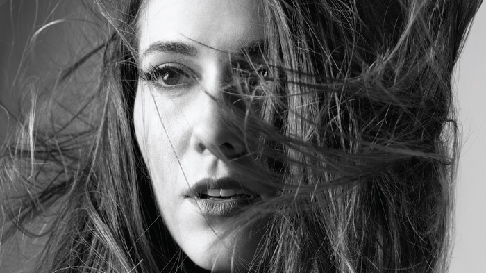 Monochrome portrait of Mary Elizabeth Winstead with hair blowing