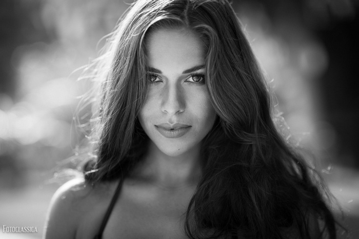 Monochrome portrait of a woman with long hair