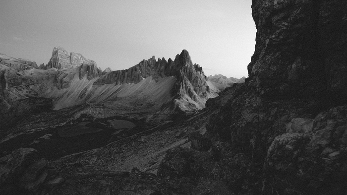 Jagged mountain peaks in a black and white landscape