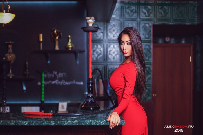 Woman in red dress with hookah