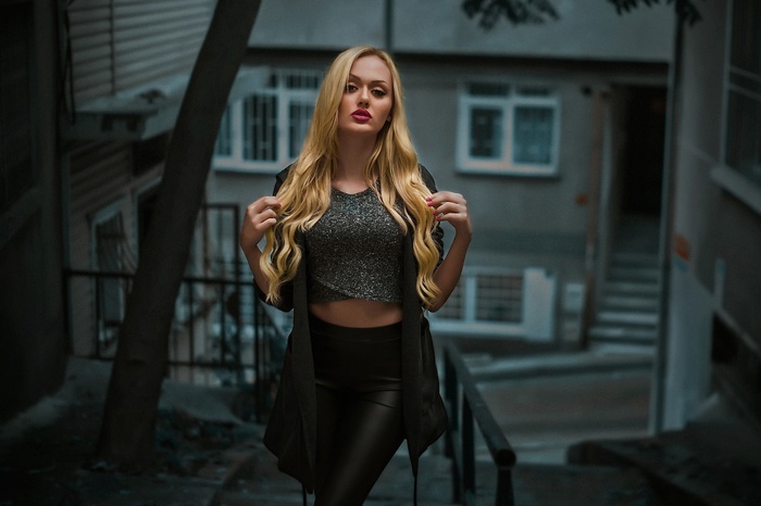 Woman in leather pants and crop top