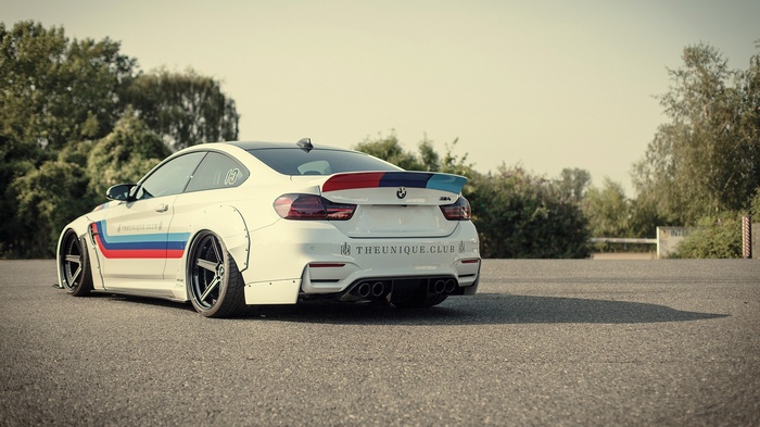White BMW M4 with Liberty Walk body kit