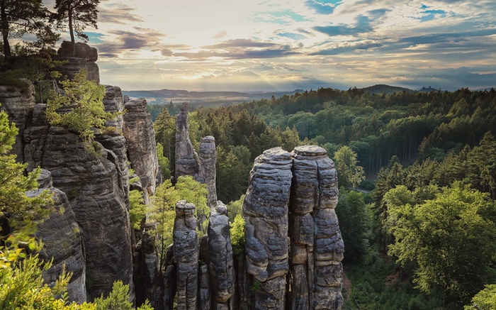 Rock formations and forest landscape at sunset in the Czech Republic