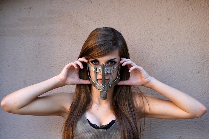 Woman in Mad Max: Fury Road mask