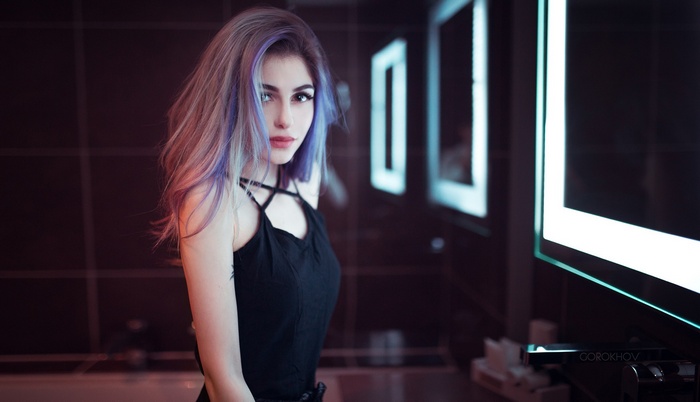 Galina Rover in a black dress with dyed hair
