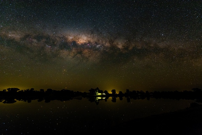 Milky Way over a lake with reflections