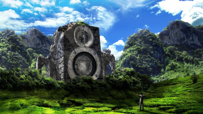 Ruined stone structure resembling a speaker in a mountainous landscape