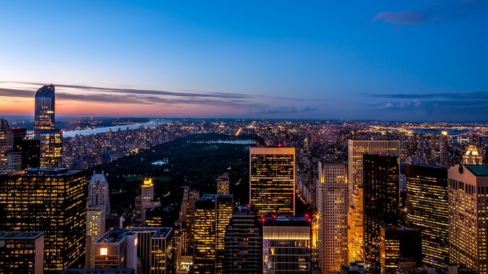 New York City skyline at dusk with Central Park