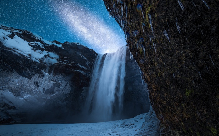 Waterfall under the Milky Way in Iceland