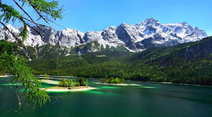Emerald lake and snowy mountains in Germany
