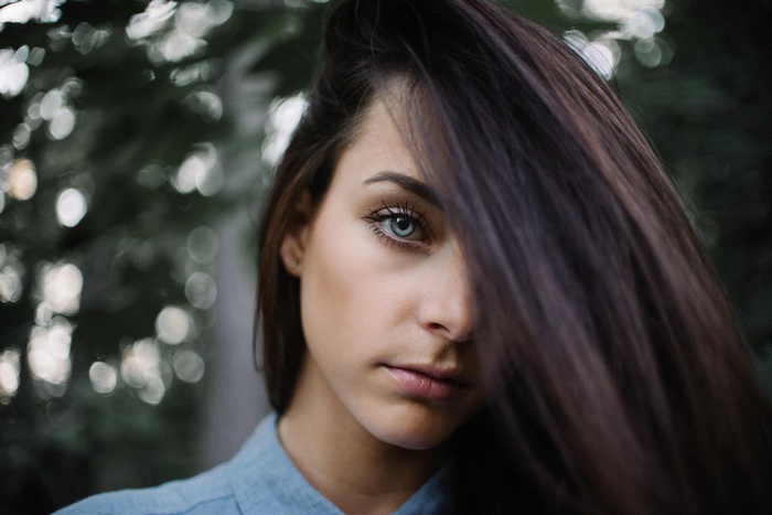 Close-up portrait of a woman with dark hair