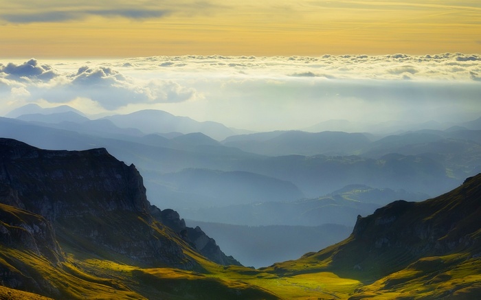 Mountains and clouds in Romania at sunset