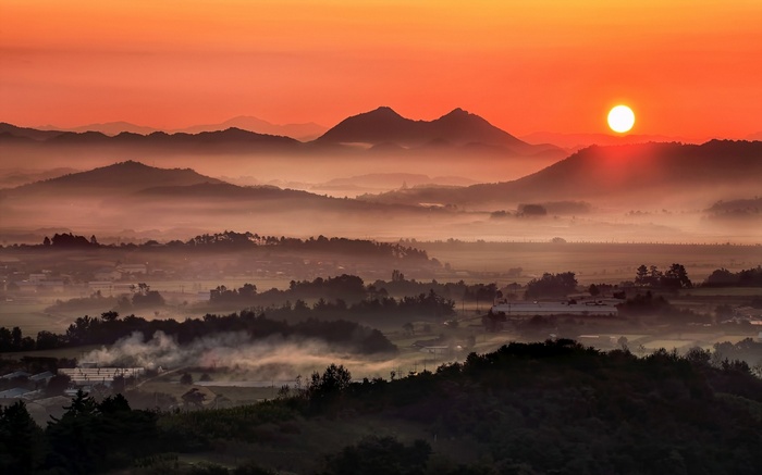 Misty valley and mountains at sunrise in South Korea