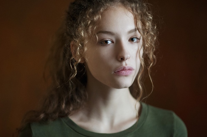 Lisa Alexanina with curly auburn hair
