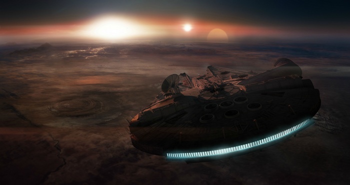 Millennium Falcon flying over a planet at sunset