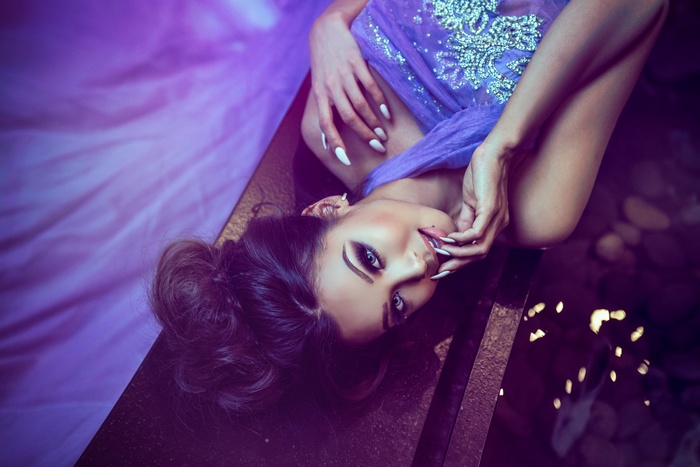 Glamorous woman with blue eyes and smoky eyes
