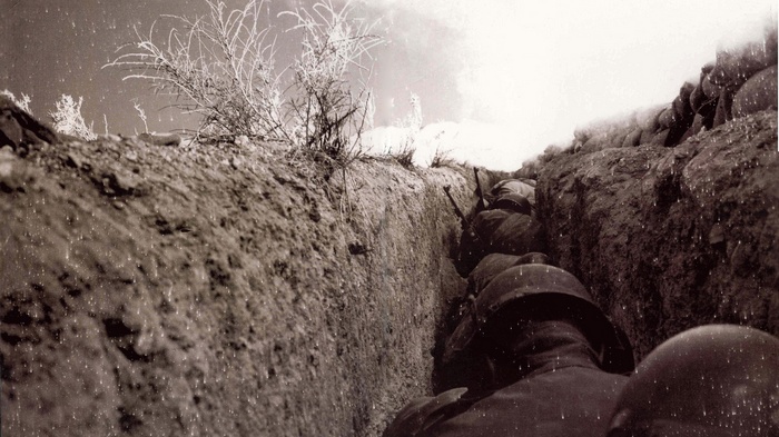 Soldiers in a trench during a military operation