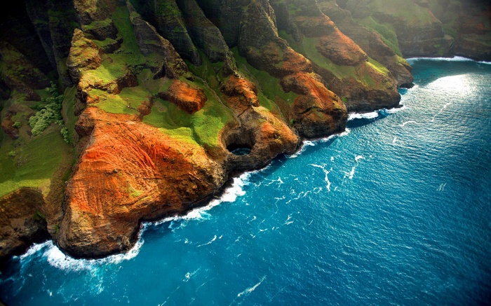Dramatic cliffs meet the turquoise sea