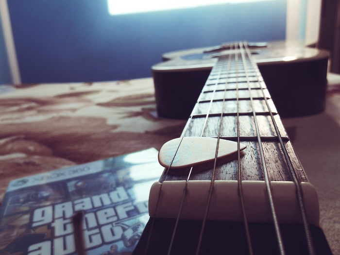 Grand Theft Auto Xbox 360 game and guitar