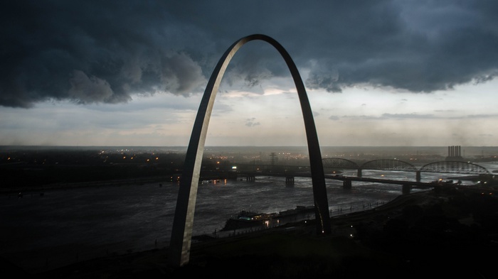 Gateway Arch National Park under stormy skies