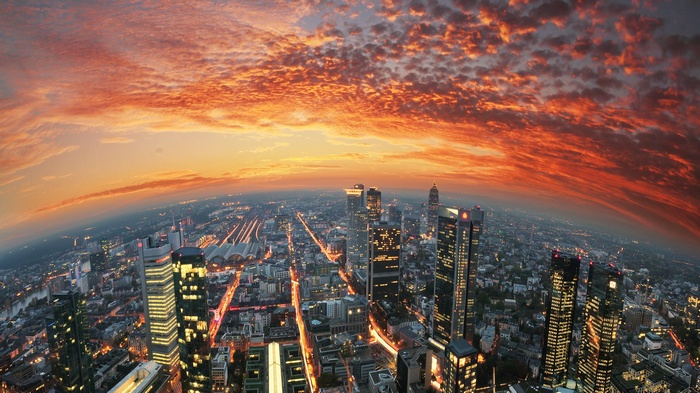 Frankfurt skyline at sunset with dramatic clouds