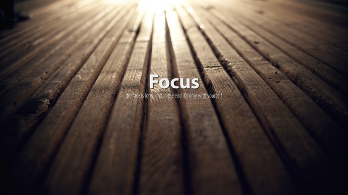 Focus quote on wooden planks