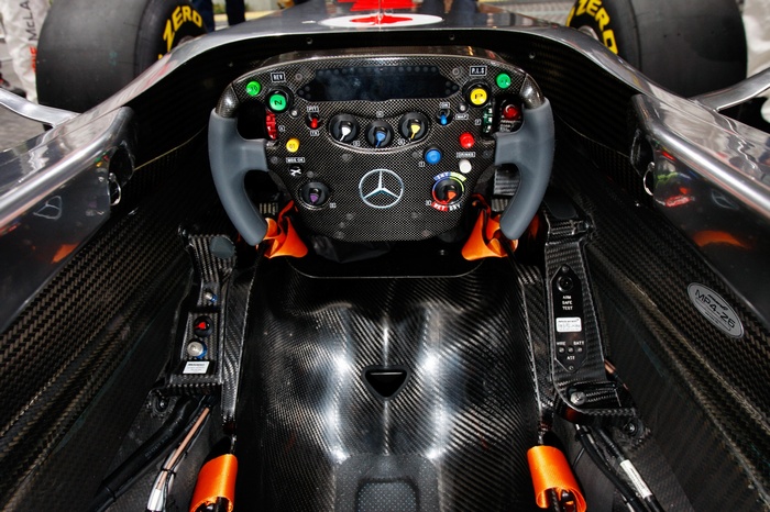 Formula 1 racing car cockpit with steering wheel