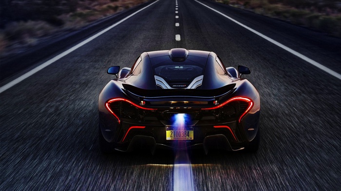 McLaren P1 driving on a road