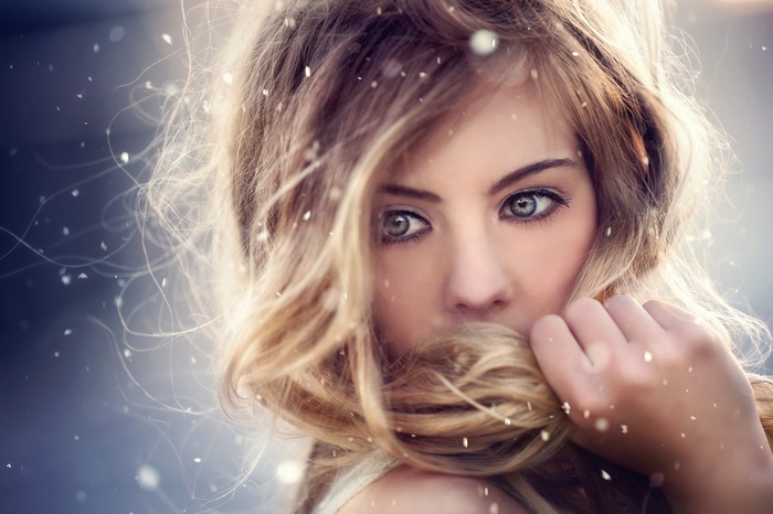 Portrait of a blonde woman with hazel eyes