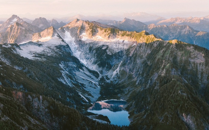 Mountain range with a lake and snow