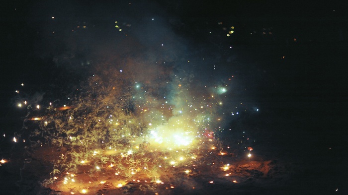 Fireworks exploding in the night sky